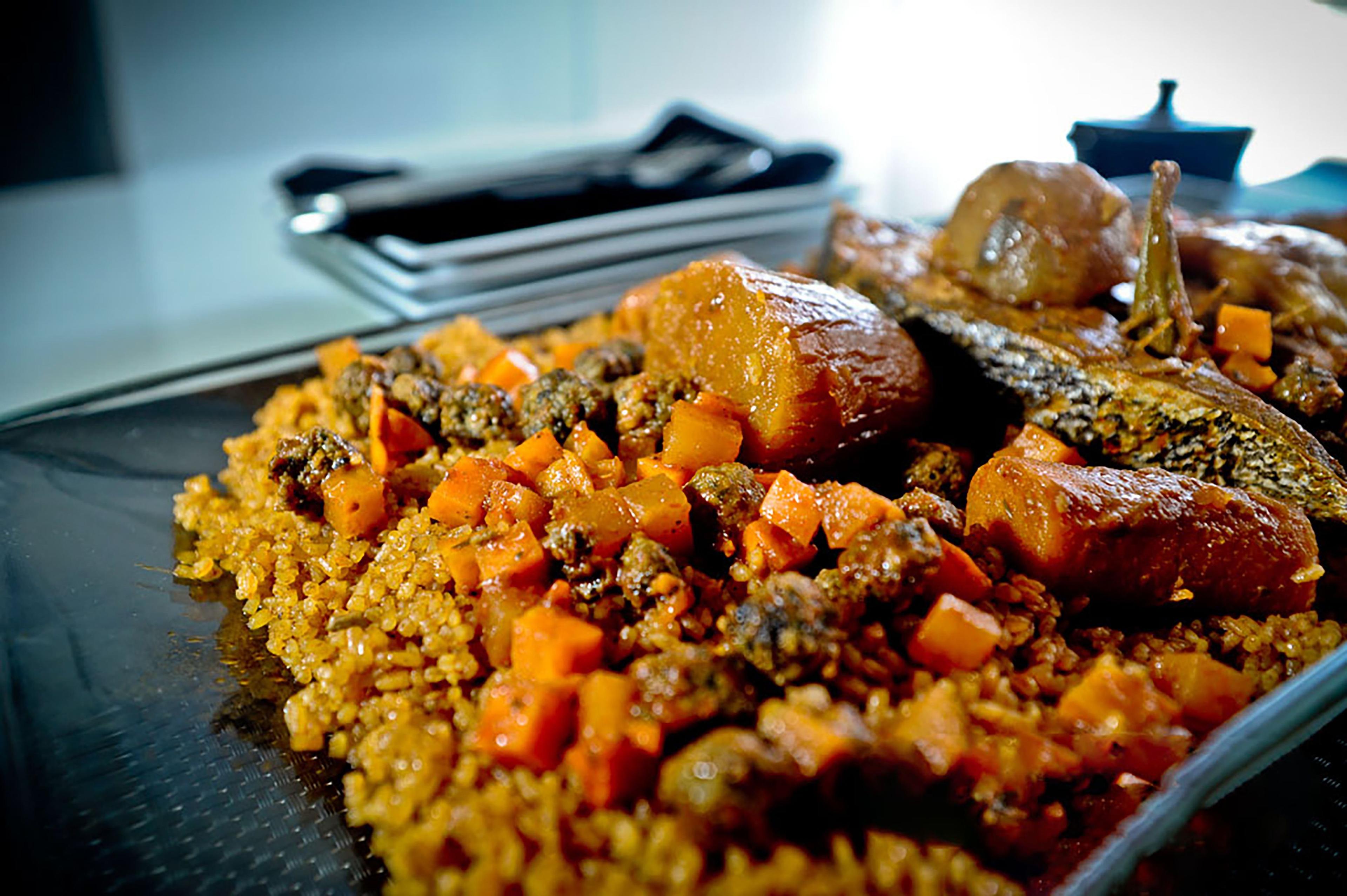 Senegalese tiep bou dien: rice stew vegetables and fishimage